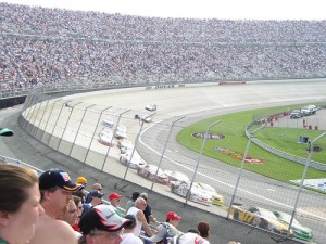 Does anybody seriously think this fence at Dover would hold up to a head-on impact from a 3500lb car traveling at 150mph?  The fence didn't have an overhang until the late 1990s.  (Photo by flickr.com user davidpb145 / Creatin Commons 2.0.)