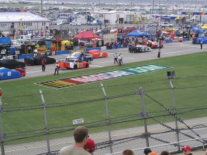 The fence at Talladega is supported by heavy cables.  Click to see a larger view of the picture.  (Photo by flickr.com user dhall / Creative Commons 2.0.)