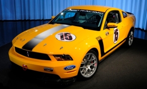 The Ford Mustang BOSS 302R features a race-ready 400-hp 5.0-liter engine, roll cage, and one badass cupholder no doubt. (Photo credit: Ford Motor Company)