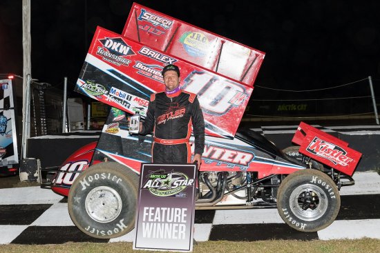 <strong>Chad Kemenah celebrates in Bubba Raceway Park victory lane - Vince Vellella photo credit</strong>