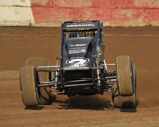 <strong>'To win here at Terre Haute is unreal,' Courtney exclaimed. 'It's something I dreamed about as a kid. (Former Terre Haute Action Track promoter) Don Smith had a big impact on getting my career going, so this one ranks right up there. I've watched Dave (Darland) and Jerry (Coons, Jr.) and all the greats that have raced before us here and they seemed to dominate. At this race, you want to be the one taking the rifle home and we get to do it this time.' (Gene Crucean Photo)</strong>