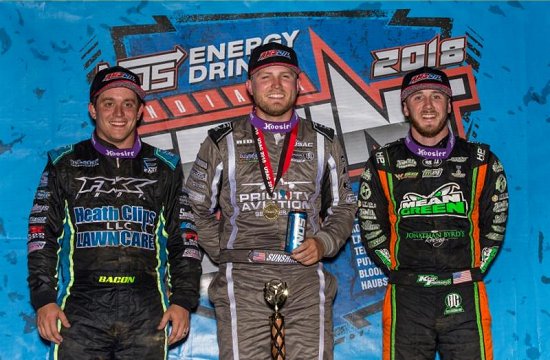 <strong>Winner Tyler Courtney (middle) is joined by 2nd place finisher Kevin Thomas, Jr. (right) and 3rd place finisher Brady Bacon (left) in victory lane following Sunday's NOS Energy Drink 'Indiana Sprint Week' round at Lawrenceburg Speedway. (Dallas Breeze Photo)</strong>