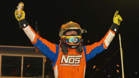 <strong>Tyler Courtney celebrates Wednesday's NOS Energy Drink Indiana Sprint Week victory at the Terre Haute Action Track.<br />
(Chad Warner Photo)</strong>