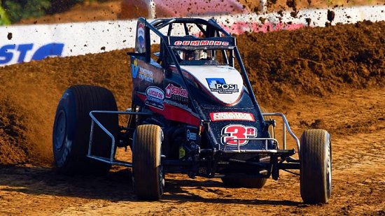 <strong>Kyle Cummins on the curb Thursday night at Lincoln Park Speedway where he'd win his third career NOS Energy Drink Indiana Sprint Week feature.<br />
(David Nearpass Photo)</strong>